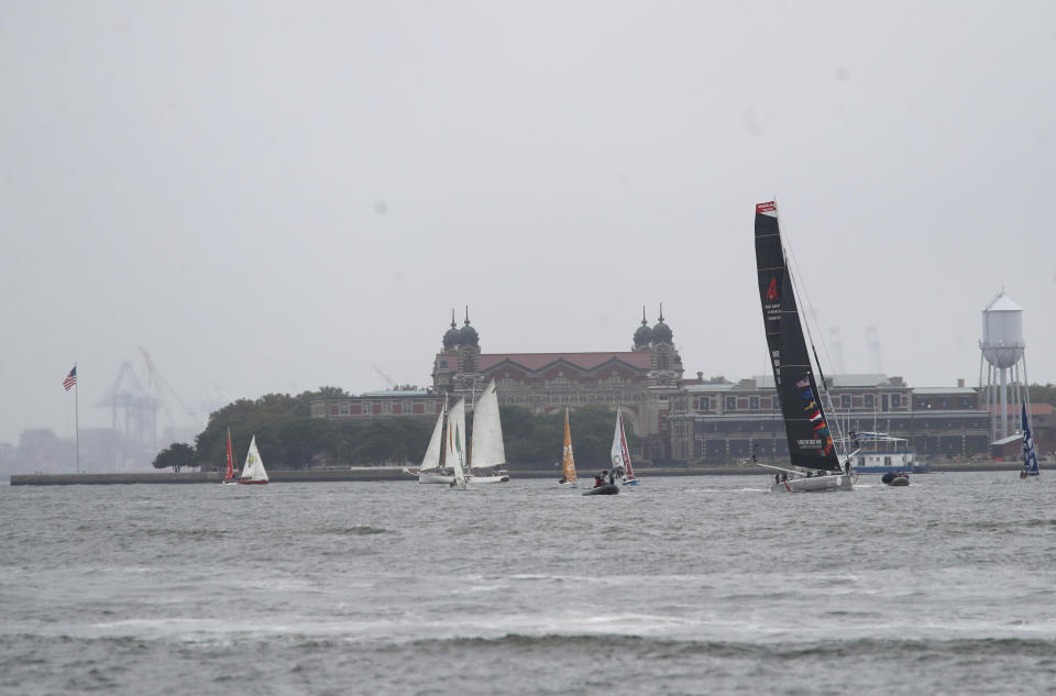 Greta Thunberg, a 16-year-old Swedish climate activist, sails into New York harbor aboard the Malizia II, Wednesday, Aug. 28, 2019. The zero-emissions yacht left Plymouth, England on Aug. 14. She is scheduled to address the United Nations Climate Action Summit on Sept. 23. (AP Photo/Mary Altaffer)