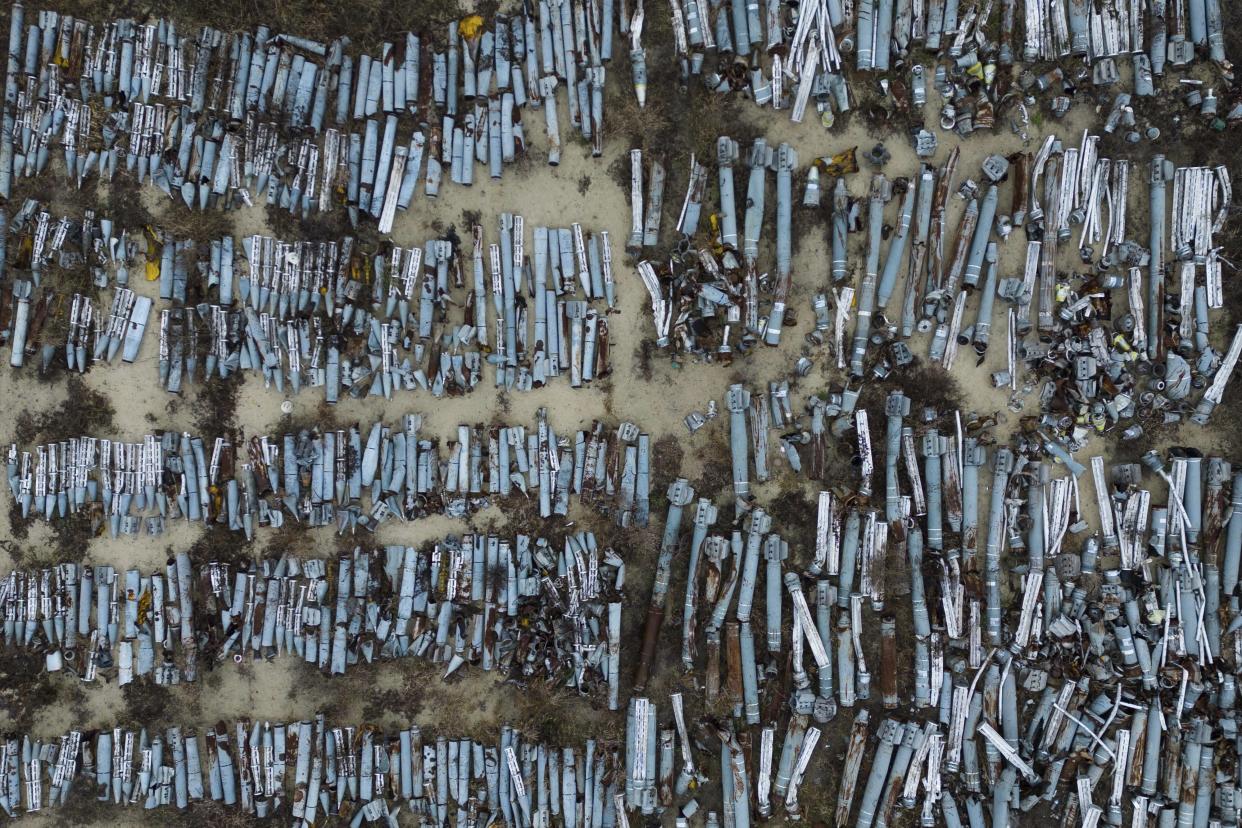 Collected parts of Russian rockets which were used to attack the city of Kharkiv are seen at a storage area, in Kharkiv, Ukraine, Thursday, Dec. 22, 2022. (AP Photo/Evgeniy Maloletka)