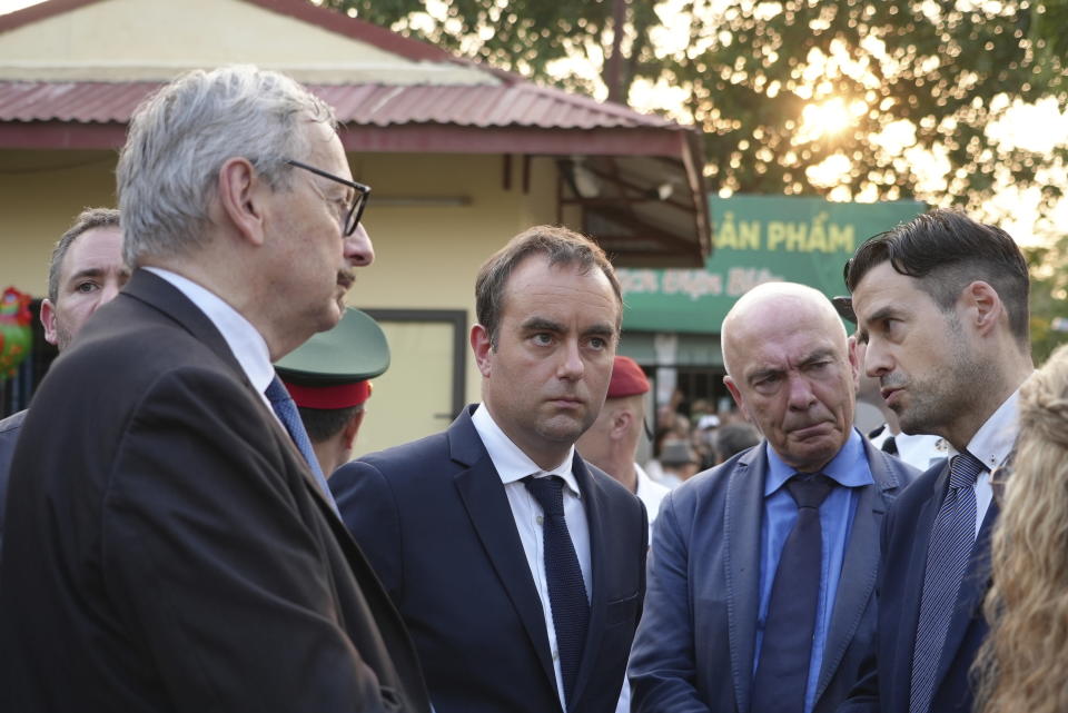 French Defense Minister Sebastien Lecornu listens as he visits a French wartime bunker preserved in Dien Bien Phu, Vietnam on Monday, May 6, 2024. Lecornu is in Vietnam to attend a ceremony to commemorate the 70th anniversary of the battle of Dien Bien Phu, where the French army was defeated by Vietnamese troops, ending French colonial rule in Vietnam. (AP Photo/Hau Dinh)