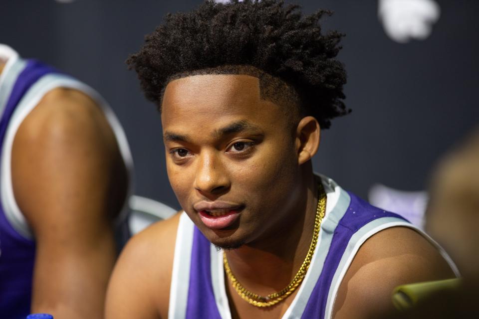 Kansas State player Tylor Perry answers questions at the Big 12 Men's Basketball media days, Wednesday, Oct. 18, 2023, at T-Mobile Center in Kansas City, Mo.