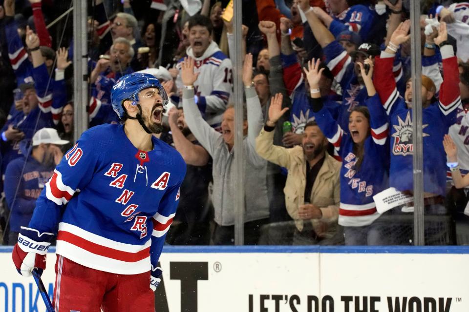 New York Rangers left wing Chris Kreider reacts after scoring against the New Jersey Devils.