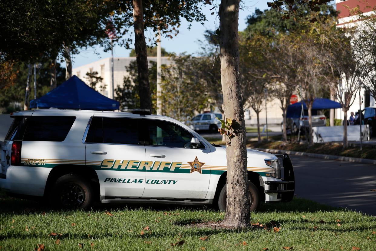A Pinellas County Sheriff deputy parked along the road.