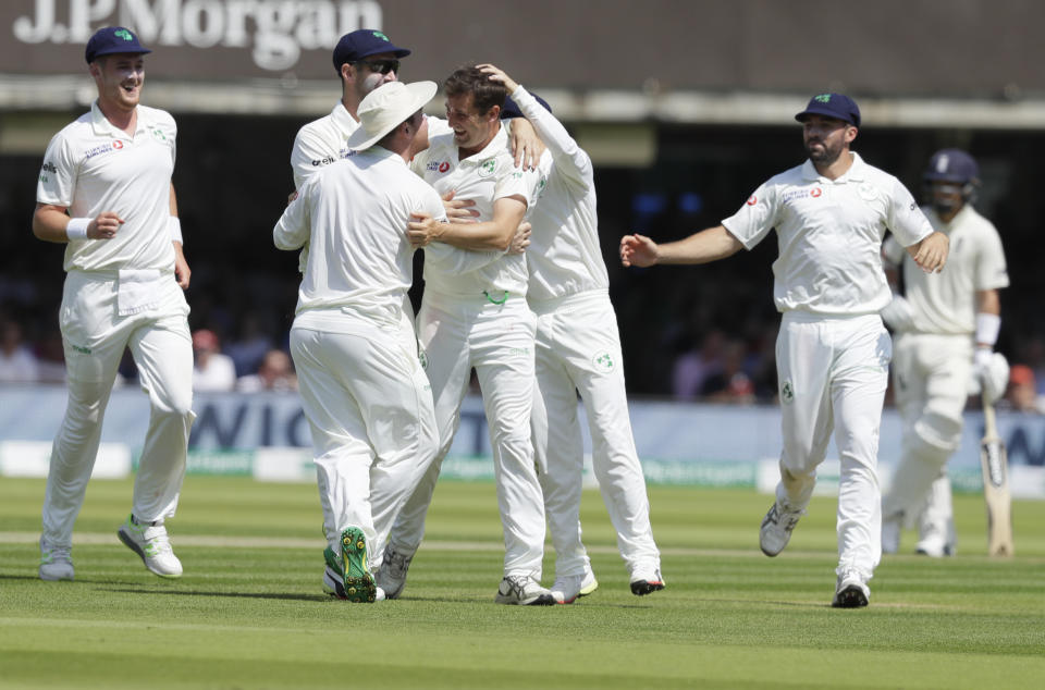 Ireland's Tim Murtagh celebrates taking his fifth wicket, the wicket of England's Moeen Ali during the first day of the test match between England and Ireland at Lord's cricket ground in London, Wednesday, July 24, 2019. (AP Photo/Kirsty Wigglesworth)