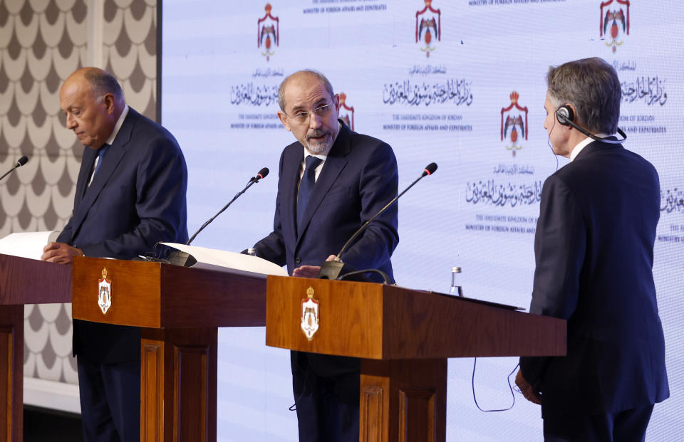 U.S. Secretary of State Antony Blinken, right, Egyptian Foreign Minister Sameh Shoukry, left, and Jordanian Deputy Prime Minister and Foreign Minister Ayman Safadi hold a press conference in Amman, Jordan, Saturday, Nov. 4, 2023. Blinken is making a new push to ease the plight of civilians. He met with Arab foreign ministers on Saturday in Jordan, the day after talks in Israel with Prime Minister Benjamin Netanyahu, who insisted there could be no temporary cease-fire until all hostages held by Hamas are released. (Jonathan Ernst/Pool via AP)