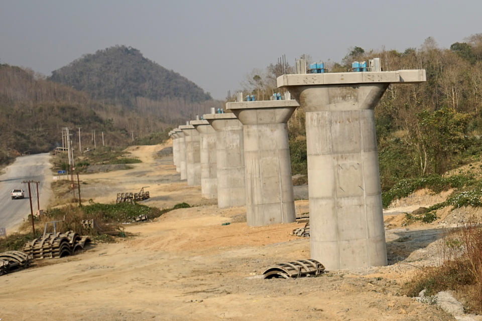 This picture taken on February 8, 2020 shows a part of the first rail line linking China to Laos, a key part of Beijing's 'Belt and Road' project across the Mekong, in Luang Prabang. From an artificial island in Sri Lanka to a bridge in Bangladesh and hydropower projects in Nepal and Indonesia, China's trillion-dollar Belt and Road plan is stuttering under the effects of the deadly coronavirus. (Photo by AIDAN JONES/AFP via Getty Images)