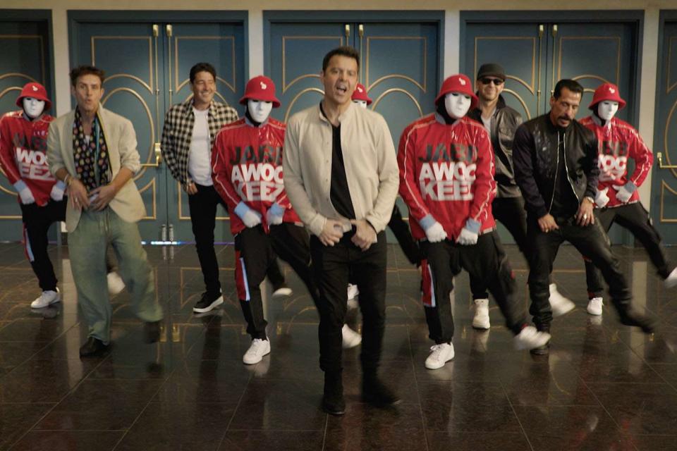 <p>NKOTB/Youtube</p> New Kids on the Block and Jabbawockeez