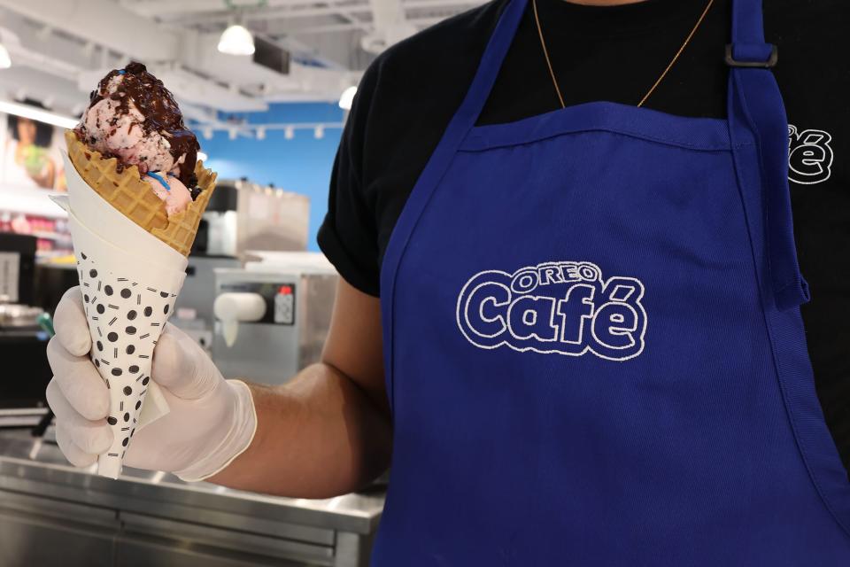 Oreo Café employee with ice cream cone