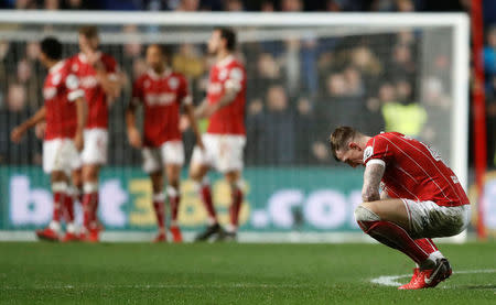 Soccer Football - Carabao Cup Semi Final Second Leg - Bristol City vs Manchester City - Ashton Gate Stadium, Bristol, Britain - January 23, 2018 Bristol City's Aden Flint looks dejected Action Images via Reuters/Carl Recine