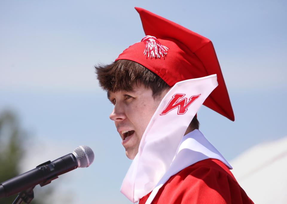 Class President Liam Goodman speaks during a windy Milton High School graduation ceremony Sunday, June 5, 2022.