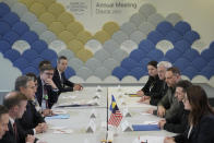 Ukrainian President Volodymyr Zelenskyy, right, attends a meeting with U.S. Secretary of State Antony Blinken, left, at the Annual Meeting of World Economic Forum in Davos, Switzerland, Tuesday, Jan. 16, 2024. The annual meeting of the World Economic Forum is taking place in Davos from Jan. 15 until Jan. 19, 2024.(AP Photo/Markus Schreiber)