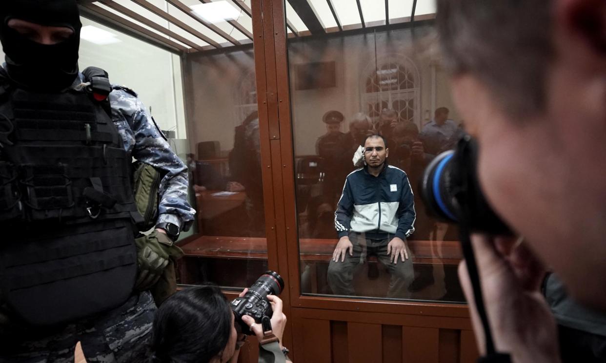 <span>Saidakrami Murodalii Rachabalizoda in a Moscow courtroom after been named as a suspect in Friday’s attack.</span><span>Photograph: Tatyana Makeyeva/AFP/Getty Images</span>