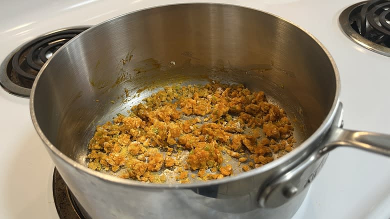 thickened curry aromatics in saucepan