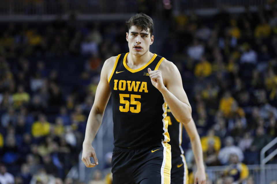 Iowa center Luka Garza reacts to a basket against Michigan in the second half of an NCAA college basketball game in Ann Arbor, Mich., Friday, Dec. 6, 2019. (AP Photo/Paul Sancya)