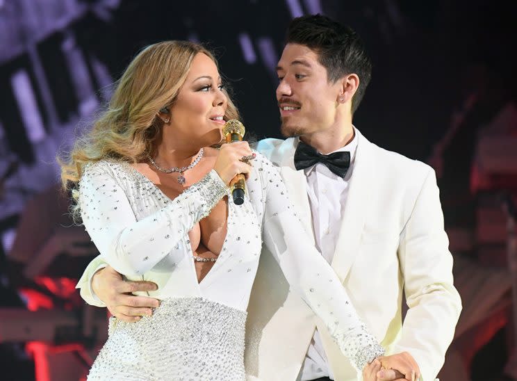 Mariah Carey and dancer Bryan Tanaka perform during the opening show of Mariah Carey: All I Want For Christmas Is You. (Photo: Jeff Kravitz/FilmMagic for Mariah Carey)