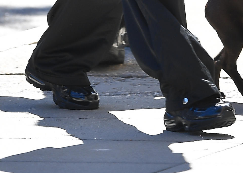 A closer look at Bella Hadid’s black sneakers. - Credit: Robert O' Neil / SplashNews.com