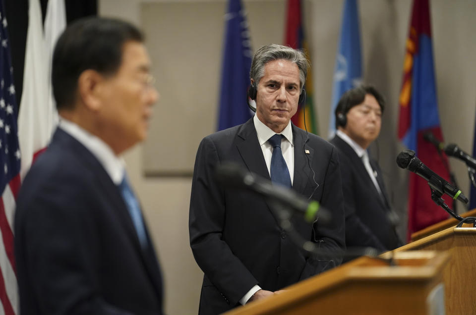 U.S. Secretary of State Antony Blinken looks towards South Korean Foreign Minister Chung Eui-yong during a joint press availability alongside Japanese Foreign Minister Yoshimasa Hayashi following their meeting in Honolulu, Saturday, Feb. 12, 2022. (Kevin Lamarque/Pool Photo via AP)