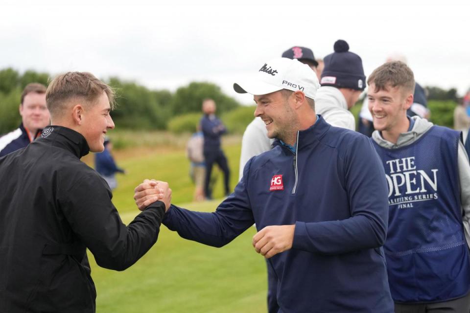 Jack McDonald (centre) celebrates qualifying for The Open <i>(Image: Getty Images)</i>