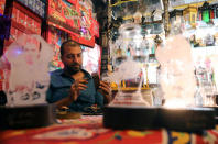 Mohamed Gamal works on making a lantern in Cairo, Egypt May 16, 2017. REUTERS/Mohamed Abd El Ghany