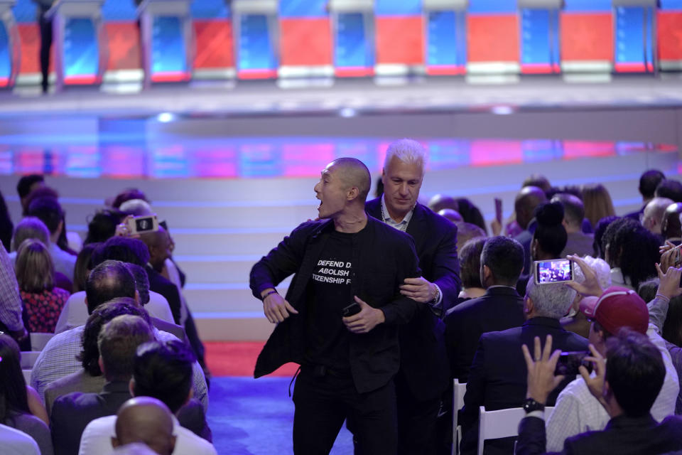 A protester at the Democratic presidential primary debate 