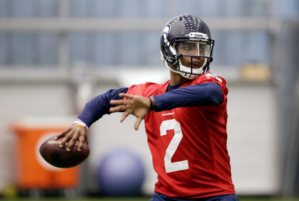 Seattle Seahawks quarterback Trevone Boykin passes during an NFL football rookie minicamp workout Sunday, May 8, 2016, in Renton, Wash. (AP Photo/Elaine Thompson)