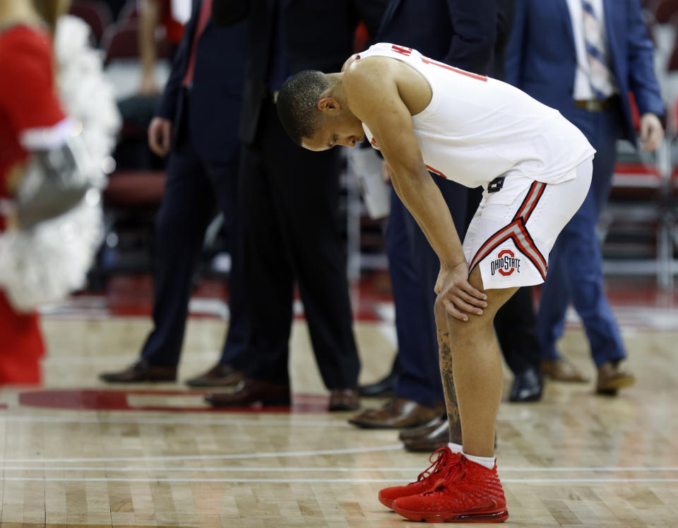Ohio State guard CJ Walker reacts following an NCAA college basketball game loss to Wisconsin in Columbus, Ohio, Friday, Jan. 3, 2020. (AP Photo/Paul Vernon)