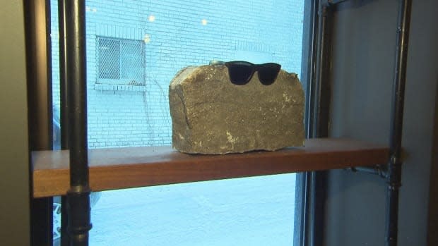 Staff at Mauvais Garçons have decided to keep the rock used in the break-in as a token of the restaurant's resilience. 