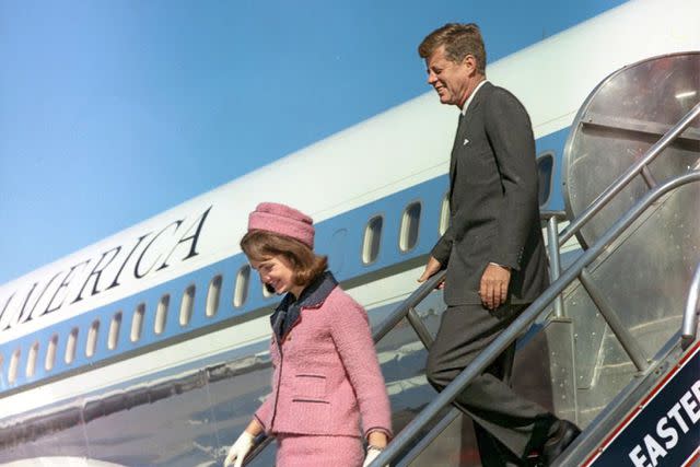 <p>White House Photographs/John F. Kennedy Presidential Library and Museum, Boston</p> Jackie and Jack Kennedy descend the steps of Air Force One after arriving in Dallas on Nov. 22, 1963