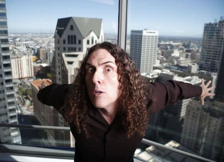 Musician "Weird Al" Yankovic poses for a portrait in the Reuters bureau in Los Angeles, California July 24, 2014. REUTERS/Lucy Nicholson