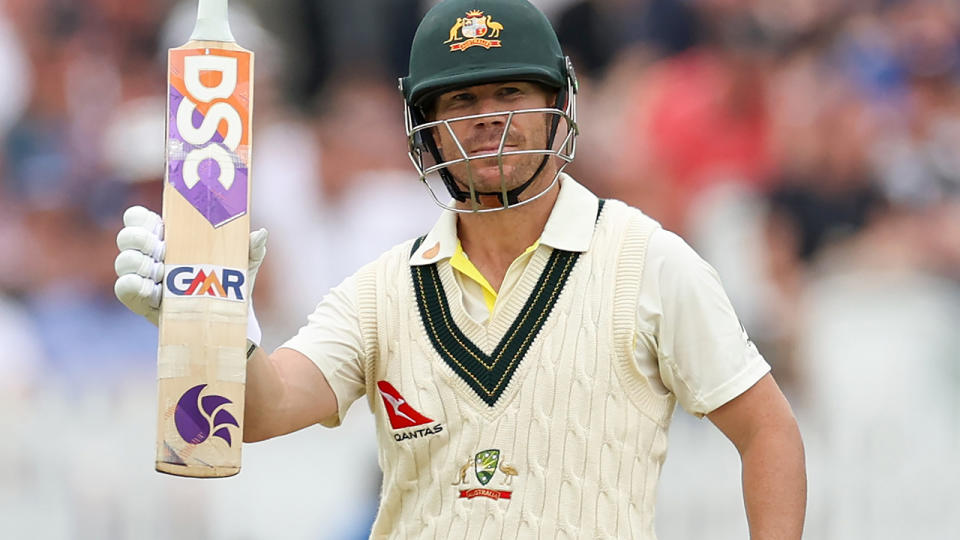 David Warner raises his bat after passing 50 in the first innings of the second Ashes Test.