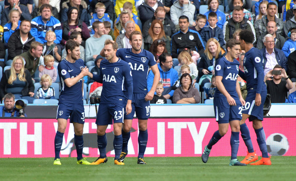 <p>Tottenham’s Ben Davies (L) celebrates scoring their second goal with team mates (REUTERS/Peter Powell) </p>