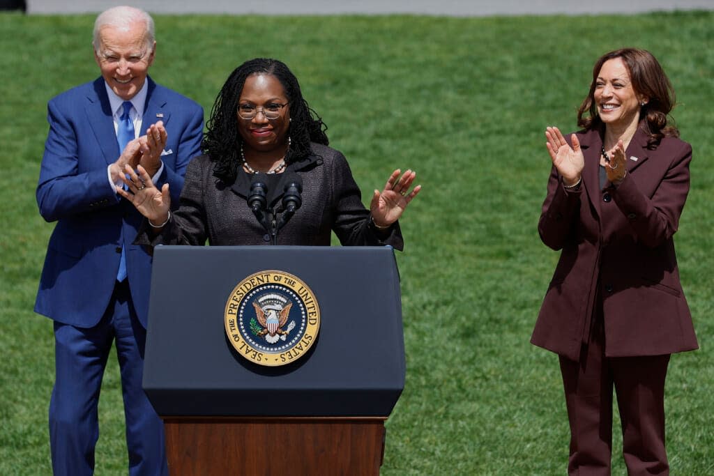 Judge Ketanji Brown Jackson (C) delivers remarks during an event celebrating her confirmation to the U.S. Supreme Court with U.S. President Joe Biden (L) and Vice President Kamala Harris (R) on the South Lawn of the White House on April 08, 2022 in Washington, DC. (Photo by Chip Somodevilla/Getty Images)