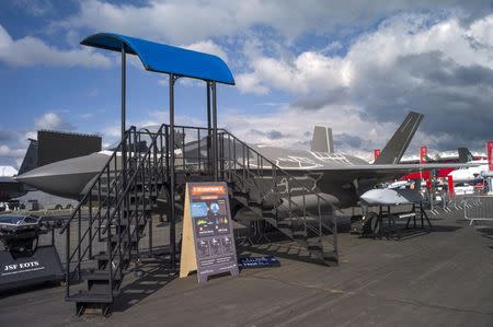 An F-35 life-size model aircraft is displayed at the 2014 Farnborough International Airshow in Farnborough, southern England July 13, 2014. REUTERS/Kieran Doherty