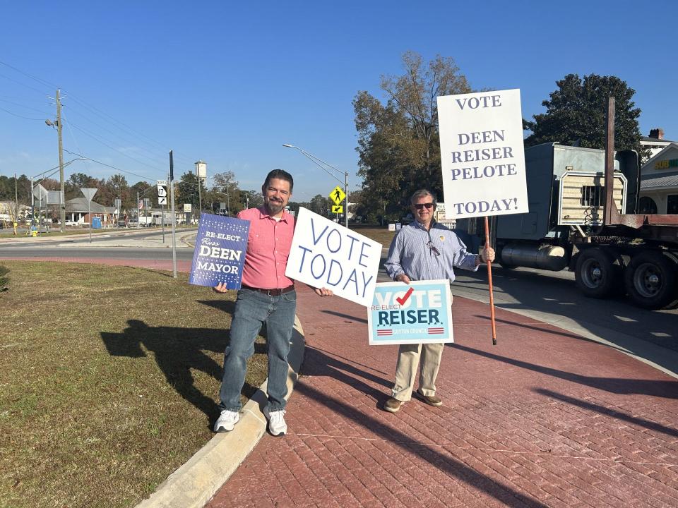 From left: Mayor Russ Deen and Marshall Reiser, who was running for city council, were spotted campaigning in the roundabout downtown Nov. 7.