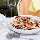 <p>No one is leaving hungry.</p><p>Get the recipe from <a href="https://www.delish.com/cooking/recipe-ideas/recipes/a12009/pasta-salad-grilled-sausages-peppers-recipe-fw0610/" rel="nofollow noopener" target="_blank" data-ylk="slk:Delish;elm:context_link;itc:0;sec:content-canvas" class="link ">Delish</a>.</p>