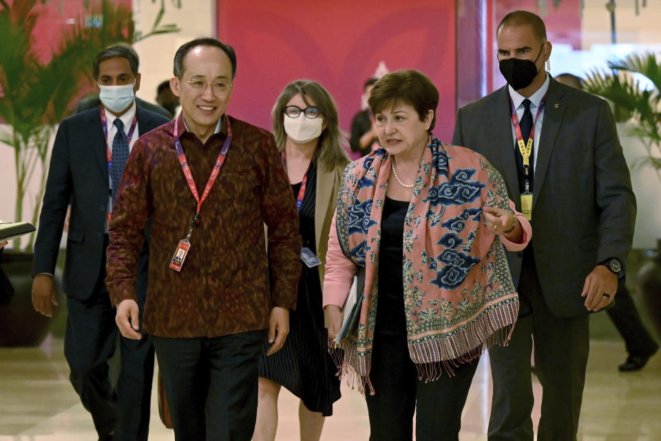 South Korean Finance Minister Choo Kyung-ho, front left, walks with International Monetary Fund Managing Director Kristalina Georgieva during their bilateral meeting on the sidelines of the G20 Finance Ministers and Central Bank Governors Meeting in Nusa Dua, Bali, Indonesia, on Saturday, July 16, 2022. (Sonny Tumbelaka/Pool Photo via AP)