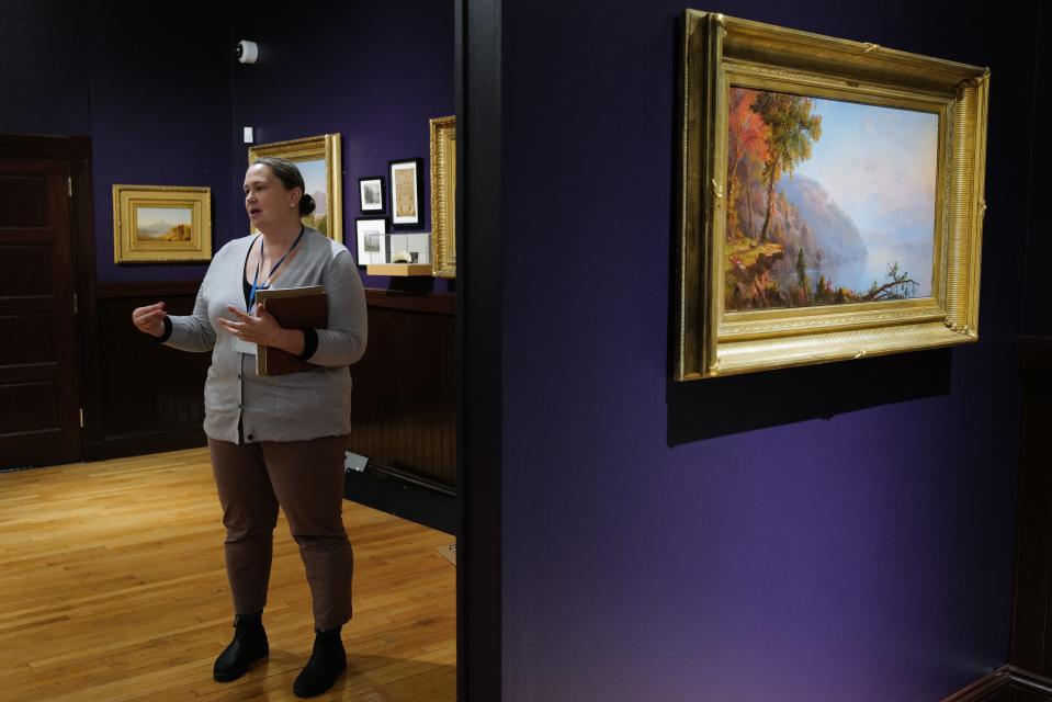 Whaling Museum curator Naomi Slipp speaks about some of the works on display at the u0022Re/Framing the View: Nineteenth-Century American Landscapesu0022 exhibit opening at the Whaling Museum in New Bedford.