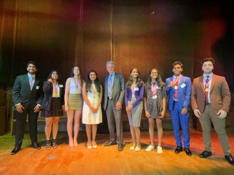 Pallone recognizes outstanding high school students at Spring awards ceremony.