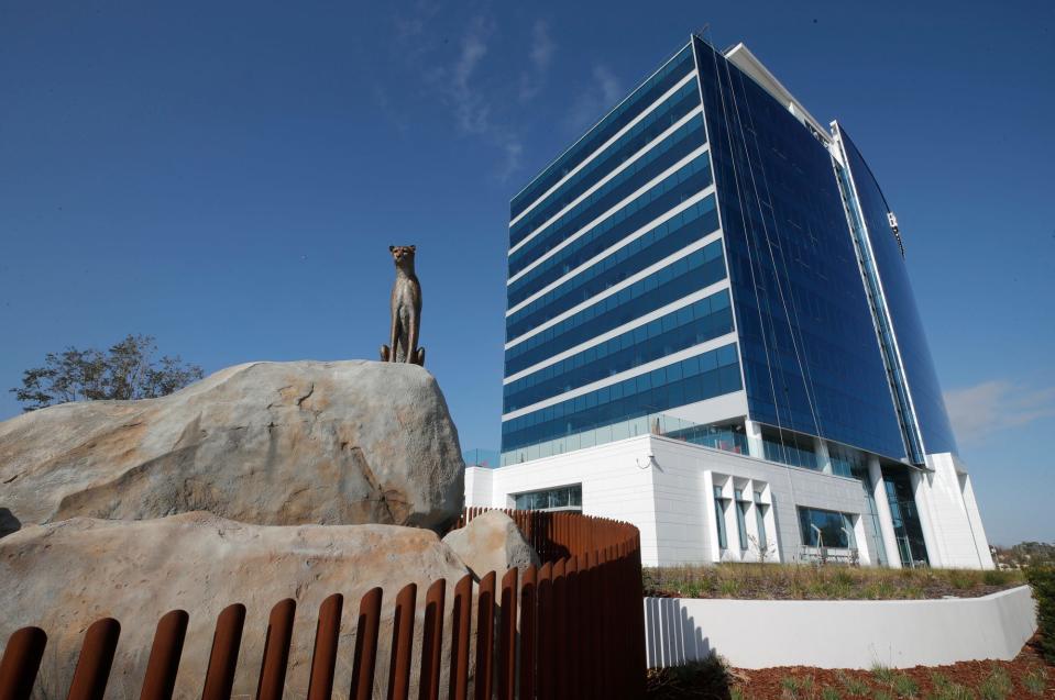 A new sculpture of a cheetah outside the 11-story headquarters of Brown & Brown Inc. on Beach Street is a symbol of the company's corporate culture of responding to change with speed, agility and intelligence, said J. Hyatt Brown, company chairman. The new sculpture was unveiled on Monday.