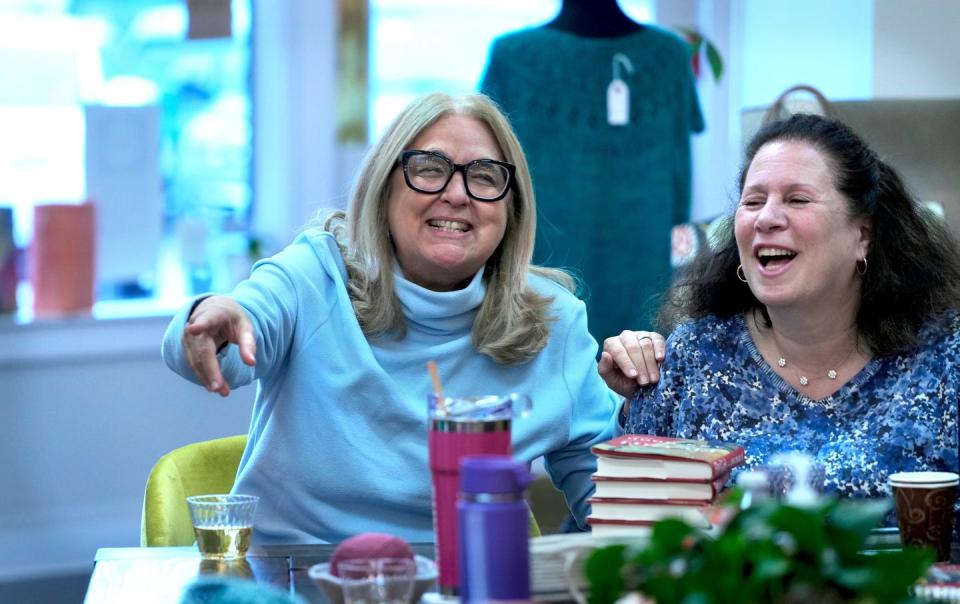 Author Ann Hood, left, shares a laugh with "Reading With Robin" host Robin Kall as they talk about Hood’s memoir "Fly Girl" at Skein Yarn Shop in East Greenwich.