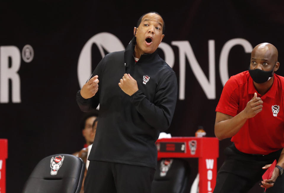 North Carolina State coach Kevin Keatts yells to his players during the first half against Charleston Southern in an NCAA college basketball game in Raleigh, N.C., Wednesday, Nov. 25, 2020. (Ethan Hyman/The News & Observer via AP)