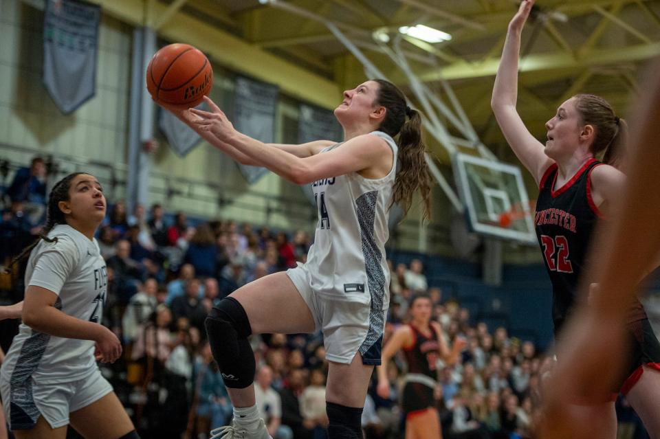 Framingham High School sophomore Allie Regan in action against Winchester in the MIAA Div. 1 sweet 16 playoff game, March 8, 2023.