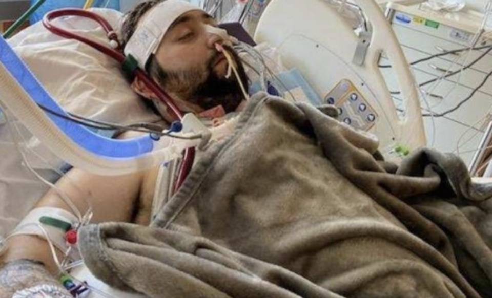 Blake Bargatze, 24, is pictured in a hospital bed.