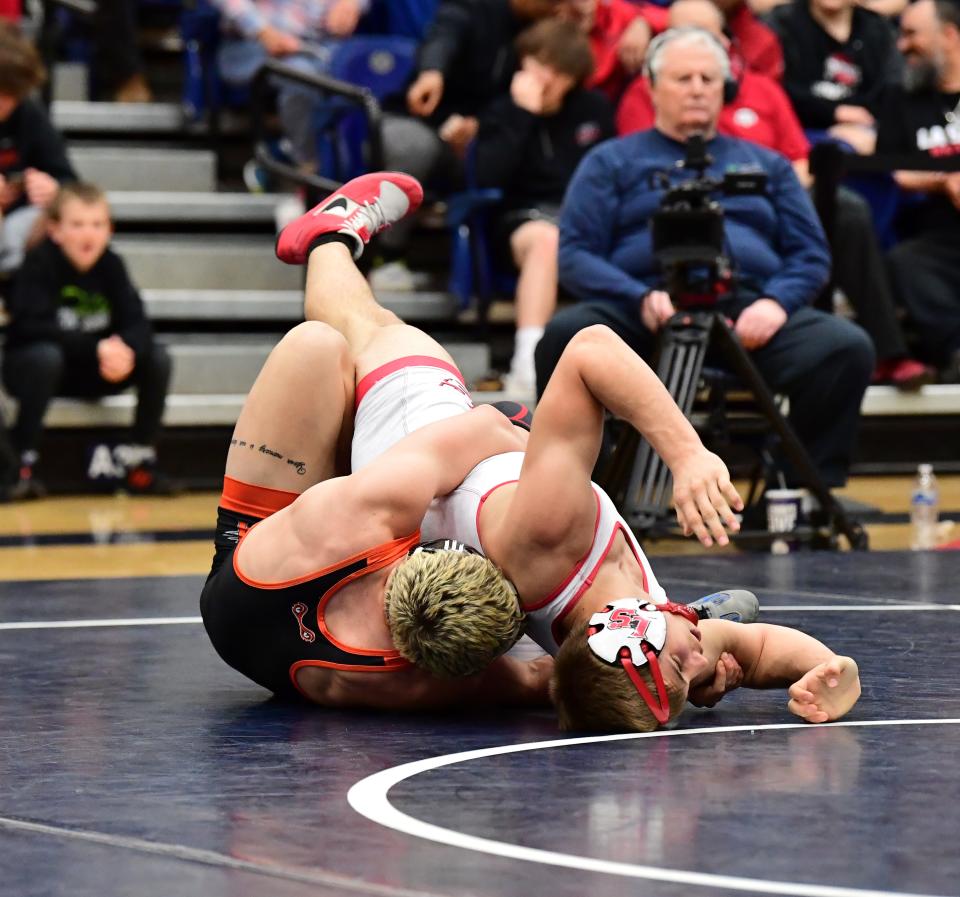 Maclain Morency of Anderson took down Jack Willen of La Salle for first place at 157 pounds at the Division I Southwest District boys wrestling championships in Kettering, Ohio, March 4, 2023.