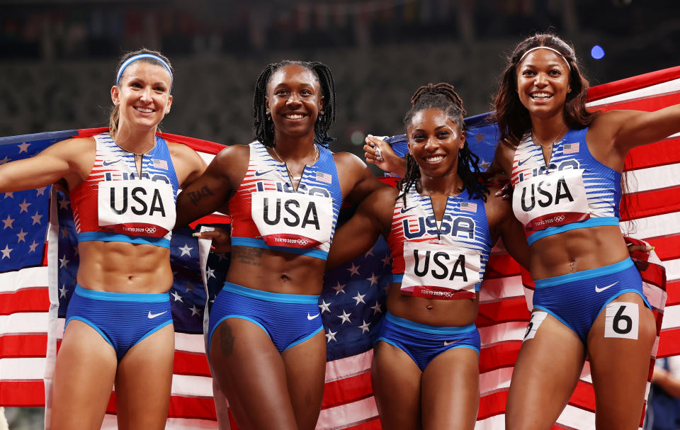 TOKYO, JAPAN - AUGUST 06: Javianne Oliver, Teahna Daniels, Jenna Prandini and Gabrielle Thomas of Team United States celebrate winning the silver medal in the Women's 4 x 100m Relay Final on day fourteen of the Tokyo 2020 Olympic Games at Olympic Stadium on August 06, 2021 in Tokyo, Japan. (Photo by David Ramos/Getty Images)