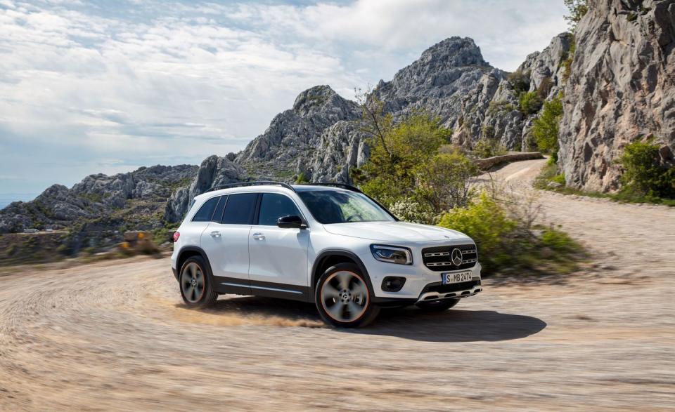 <p>Recognizing that buyers can't get enough of smallish premium crossovers and SUVs, Mercedes-Benz is shoehorning <a href="https://www.caranddriver.com/news/a27886871/2020-mercedes-benz-glb250-photos-info/" rel="nofollow noopener" target="_blank" data-ylk="slk:a new model;elm:context_link;itc:0;sec:content-canvas" class="link ">a new model</a>, <a href="https://www.caranddriver.com/mercedes-benz/glb-class" rel="nofollow noopener" target="_blank" data-ylk="slk:the GLB;elm:context_link;itc:0;sec:content-canvas" class="link ">the GLB</a>, into its lineup between the subcompact GLA-class and the compact GLC-class. The GLB one-ups both of those models (which have two rows of seating) with an available third-row perch. It might only be for children, but hey, it's a differentiator—as is the GLB's boxy, more overtly SUV-like styling. </p>