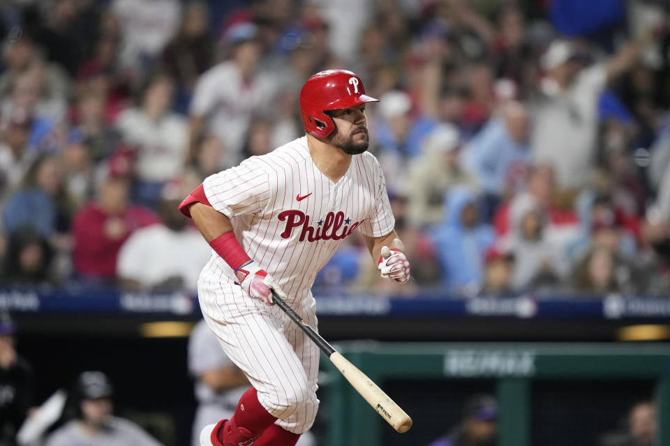 Philadelphia Phillies' Kyle Schwarber watches after hitting a home run against Colorado Rockies relief pitcher Dinelson Lamet during the seventh inning of a baseball game, Friday, April 21, 2023, in Philadelphia. (AP Photo/Matt Slocum)