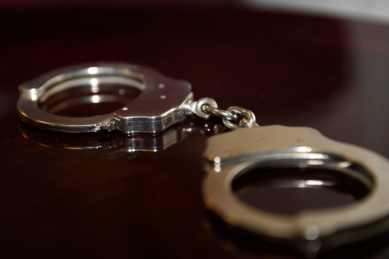 Handcuffs sit on a table at the Richmond County Sheriff's Office South Precinct on Wednesday, Nov. 24, 2021.  