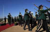 Presidential guards parade during the official welcoming ceremony of German Chancellor Olaf Scholz at the Union Building in Pretoria, South Africa, Tuesday, May 24, 2022. (AP Photo/Themba Hadebe)
