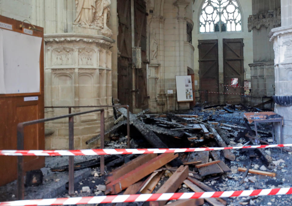 A view of debris caused by a fire inside the Cathedral of Saint Pierre and Saint Paul in Nantes, France, July 18, 2020. REUTERS/Stephane Mahe