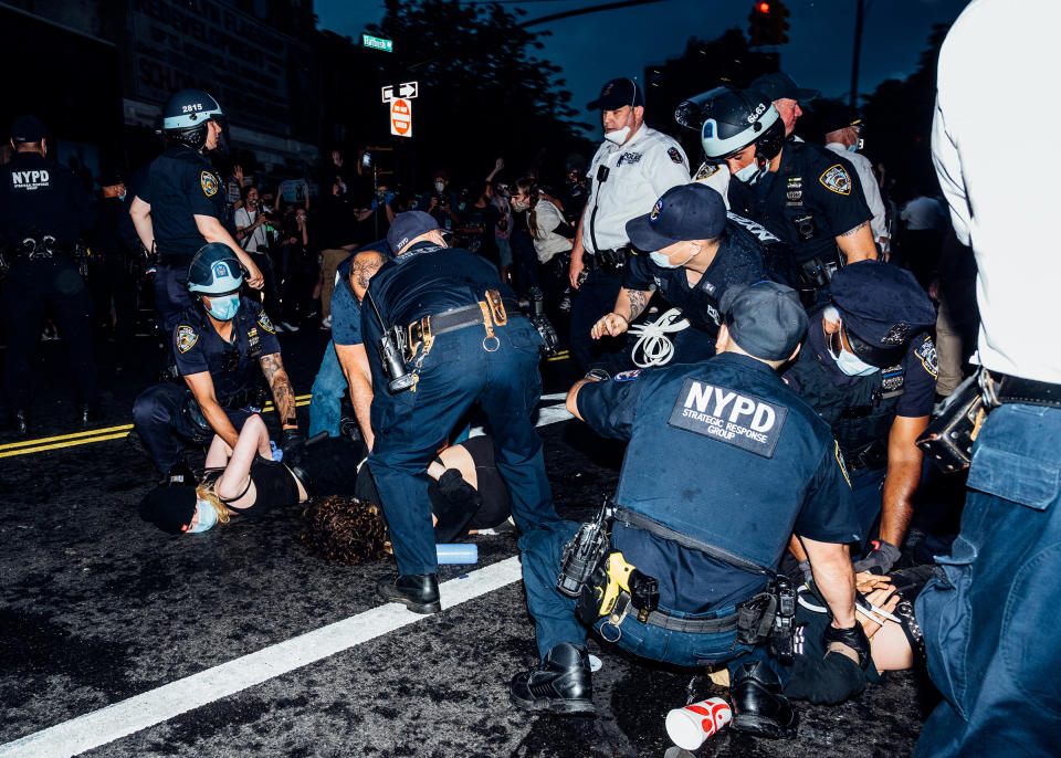 Demonstrators are detained during a protest near Brooklyn's Barclays Center on May 29. | Malike Sidibe for TIME